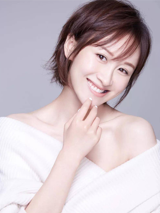 练束梅